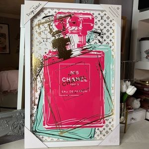 Design District Studio Chanel frame with LV logo